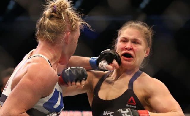 Rousey is punched by Holm. Pic: Getty