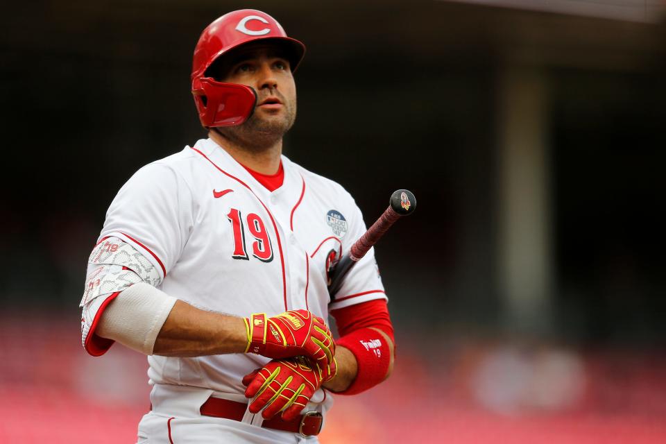Cincinnati Reds designated hitter Joey Votto (19) warms up in the on-deck circle in the first inning of the MLB National League game between the Cincinnati Reds and the Washington Nationals at Great American Ball Park in downtown Cincinnati on Thursday, June 2, 2022.