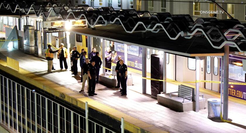 Police investigate the scene of a shooting at the Metro Rain La Cienega/Jefferson station on Friday, June 21, 2024.