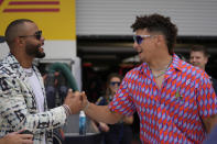 Dallas Cowboys quarterback Dak Prescott , left, and Kansas City Chiefs quarterback Patrick Mahomes greet each other in the Red Bull garage before the Formula One Miami Grand Prix auto race at the Miami International Autodrome, Sunday, May 7, 2023, in Miami Gardens, Fla. (AP Photo/{sum}) (AP Photo/Rebecca Blackwell)