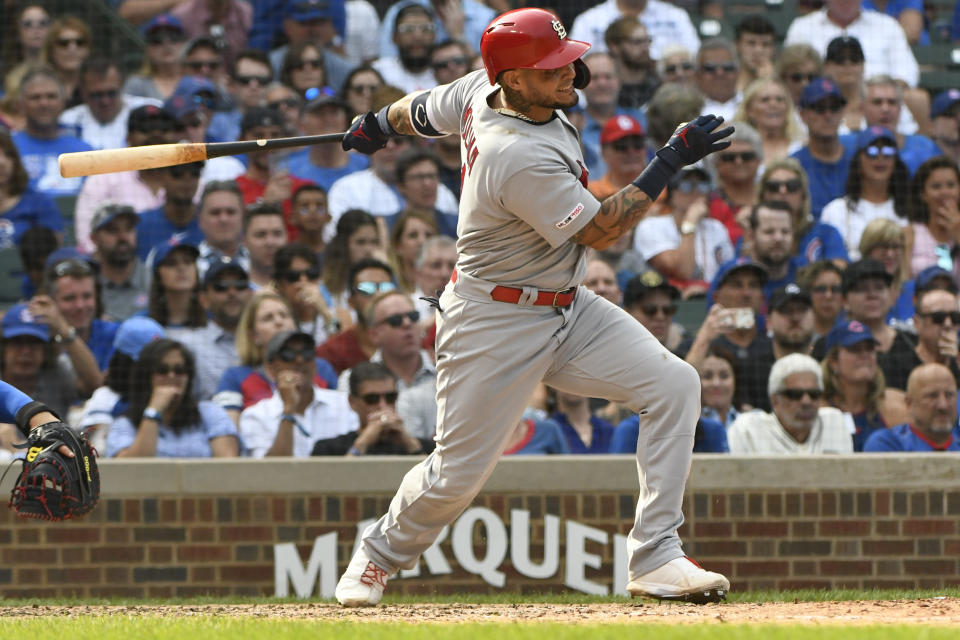 St. Louis Cardinals' Yadier Molina (4) hits a two-RBI single during the sixth inning of a baseball game against the Chicago Cubs, Friday, Sept. 20, 2019, in Chicago. (AP Photo/Matt Marton)