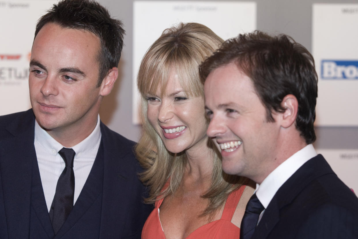 Television star Amanda Holden appears at a photo call with fellow celebrities Ant and Dec (Anthony McPartlin and Decland Donnelly) at the start of the Edinburgh International Television Festival. The annual festival was staged at the city's conference center and attracted media personalities from across the industry. (Photo by Colin McPherson/Corbis via Getty Images)