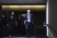 Federal Reserve Chairman Jerome Powell leaves after testifying before a Senate Banking, Housing and Urban Affairs Committee hearing on the CARES Act on Capitol Hill, Tuesday, Sept. 28, 2021 in Washington. (Matt McClain/The Washington Post via AP, Pool)