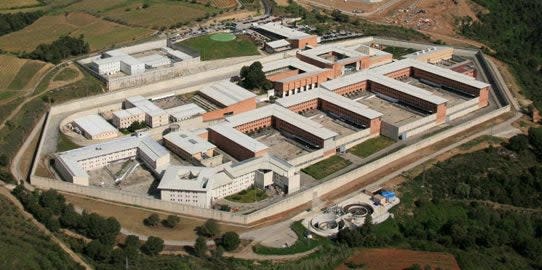 <p>The Centre Penitenciari Brians 1 in Catalonia where McAfee is incarcerated</p>Europris