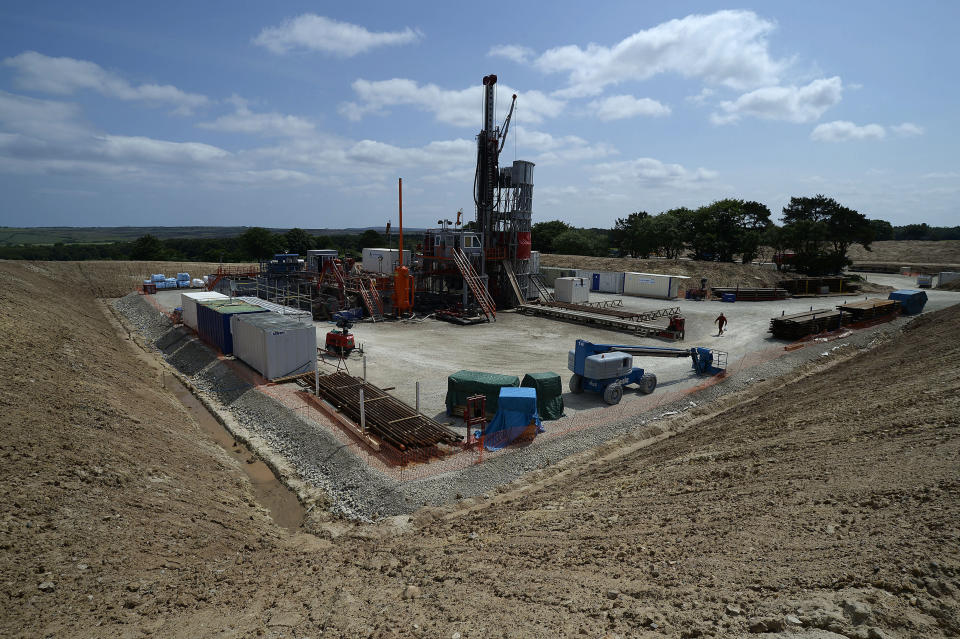 The Sirius Minerals test drilling station is seen on the North Yorkshire Moors near Whitby, northern England July 5, 2013. Sirius Minerals, is planning one of the world's largest potash mines in response to booming global demand for the crop fertilizer, within the North York Moors National Park boundaries.  "There's a huge amount of paper work to deal with. Everyone's watching; there's pressure on both sides," operations director Graham Clarke told Reuters at the drill site near the coastal town of Whitby, where a large red rig pierces a clear summer sky. Photograph taken on July 5, 2013.  REUTERS/Nigel Roddis (BRITAIN - Tags: BUSINESS ENERGY ENVIRONMENT)