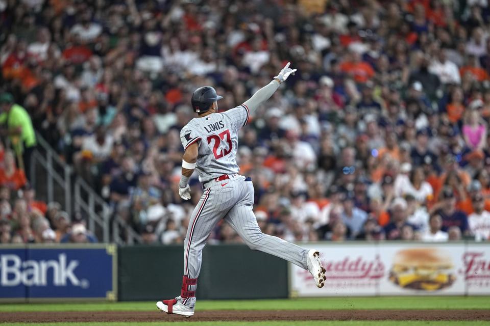 Minnesota Twins' Royce Lewis celebrates after hitting a three-run home run against the Houston Astros during the third inning of a baseball game Monday, May 29, 2023, in Houston. (AP Photo/David J. Phillip)