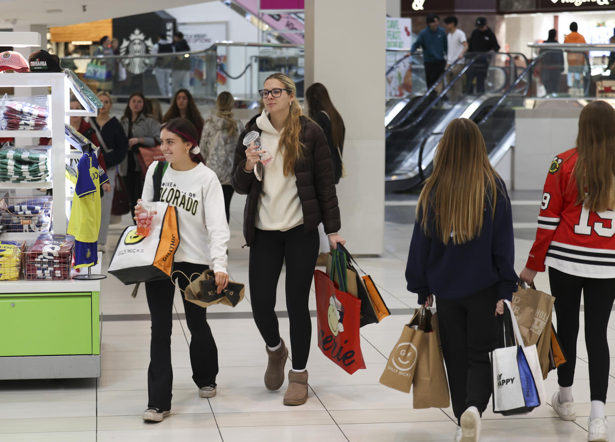 Black Friday shoppers walk around Woodfield Mall in Schaumburg, Illinois, on Friday, Nov. 24, 2023. (Trent Sprague/Chicago Tribune/Tribune News Service via Getty Images)