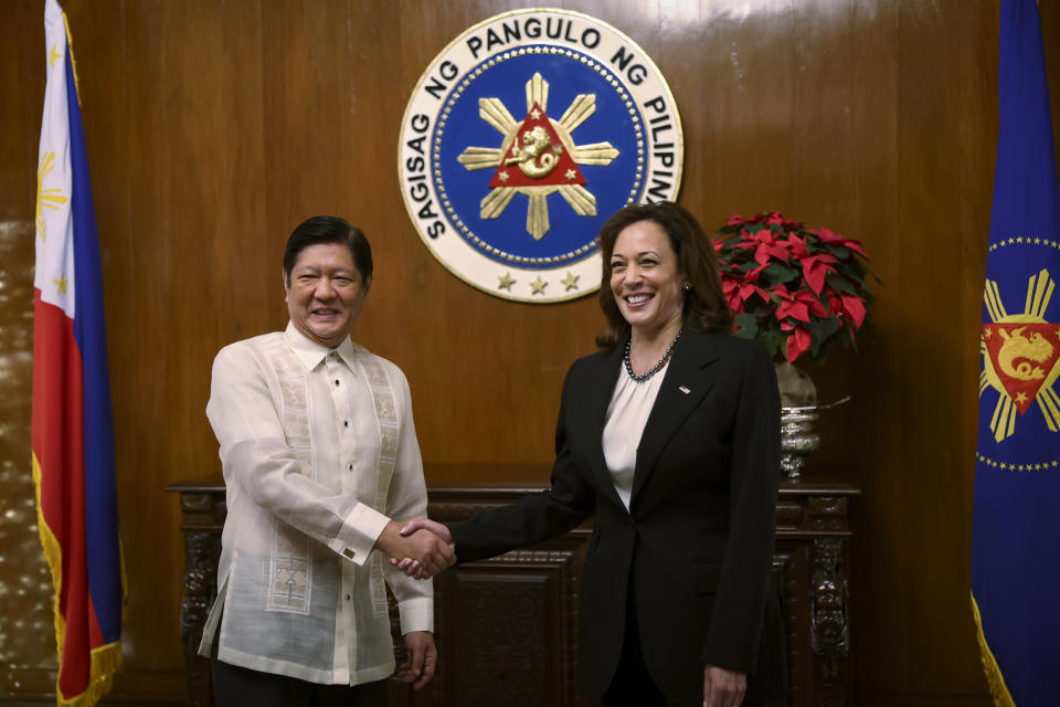 U.S. Vice President Kamala Harris, right, shakes hands with Philippine President Ferdinand Marcos Jr. at the Malacanang presidential palace in Manila, Philippines Monday, Nov. 21, 2022 (Eloisa Lopez/Pool Photo via AP)