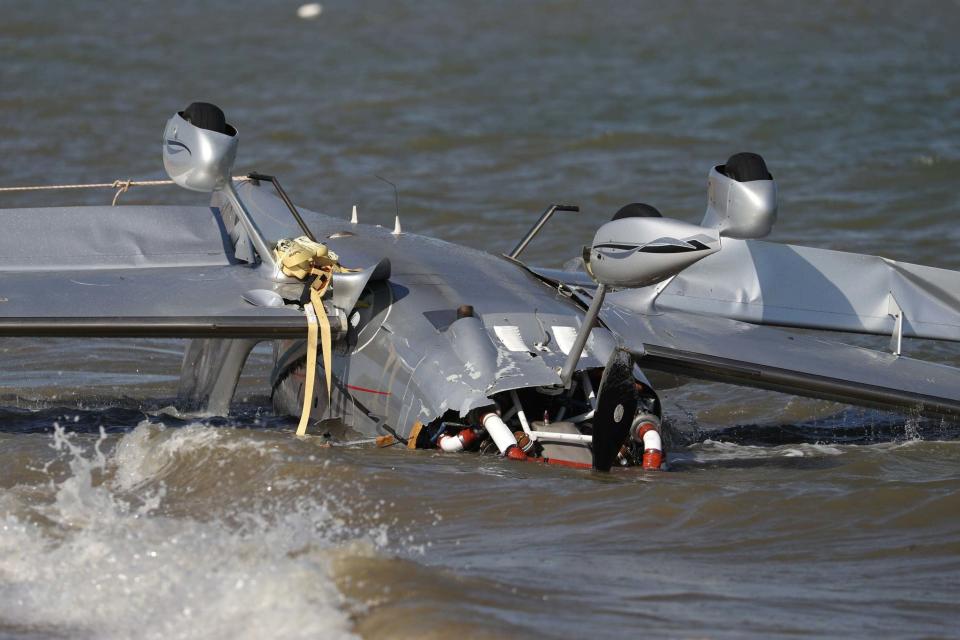 The wreckage later washed up on the beach (PA)