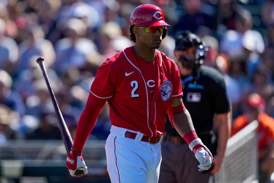 Cincinnati Reds shortstop Jose Barrero (2) returns to the dugout after striking out in the second inning of the MLB Cactus League spring training game between the Cincinnati Reds and the Cleveland Guardians at Goodyear Ballpark in Goodyear, Ariz., on Saturday, Feb. 25, 2023.