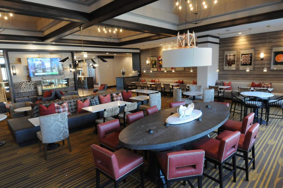 The Homewood Suites by Hilton hotel features several of table seating for guest to enjoy their hot breakfast that comes with the overnight stay in the downtown hotel.