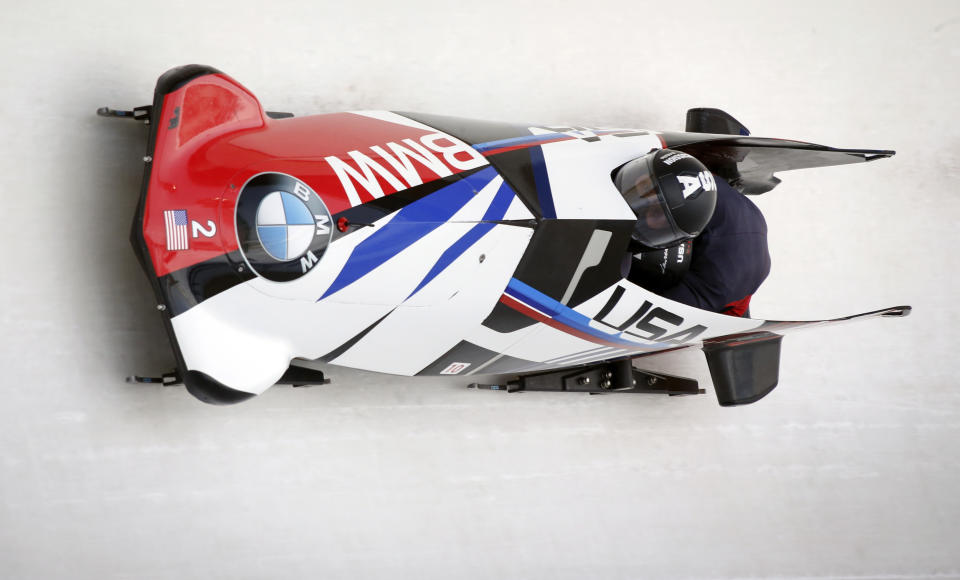 Taylor Elana Meyers, left, and Lauren Gibbs, of the United States, compete during the women's World Cup boblsed event in Calgary, Alberta, Saturday, Feb. 23, 2019. (Jeff McIntosh/The Canadian Press via AP)