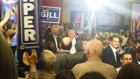 Conservative Leader Stephen Harper and Toronto Mayor Rob Ford shake hands during a rally in Brampton, Ont., on Friday night.