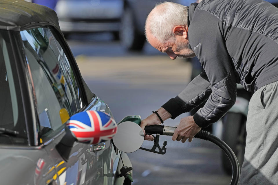 petrol  A man fills his car at a petrol station in London, Wednesday, Sept. 29, 2021. Prime Minister Boris Johnson sought to reassure the British public Tuesday that a fuel-supply crisis snarling the country was “stabilizing,” though his government said it would be a while before the situation returns to normal. Johnson's government has put army troops on standby to help distribute gasoline and help ease a fuel drought, triggered by a shortage of truck drivers, that has drained hundreds of pumps and sent frustrated drivers on long searches for gas. (AP Photo/Frank Augstein)