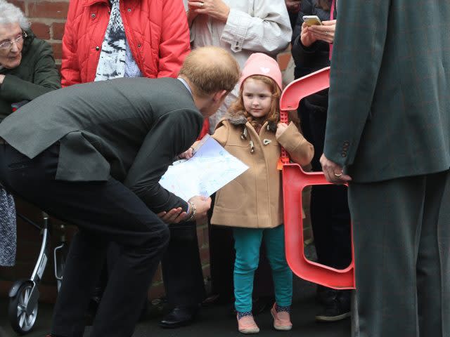 The prince was presented with a drawing by a young fan in St Michael's on Wyre