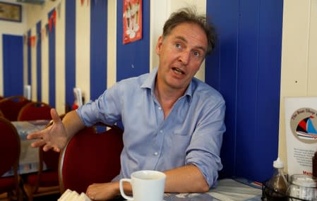 Parliamentary candidate for the Labour Party, Simon Letts answers a journalist's questions in a cafe in the constituency of Southampton Itchen