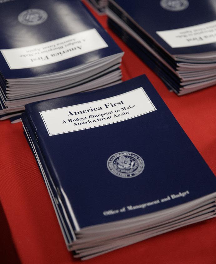 Copies of President Donald Trump's first budget are displayed at the Government Printing Office in Washington, Thursday, March, 16, 2017. Trump unveiled a $1.15 trillion budget on Thursday, a far-reaching overhaul of federal government spending that slashes many domestic programs to finance a significant increase in the military and make a down payment on a U.S.-Mexico border wall. (AP Photo/J. Scott Applewhite)