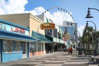 South Carolina's Myrtle Beach, pictured, and Virginia Beach, further north are popular destinations particularly vulnerable to the full force of stormy seas