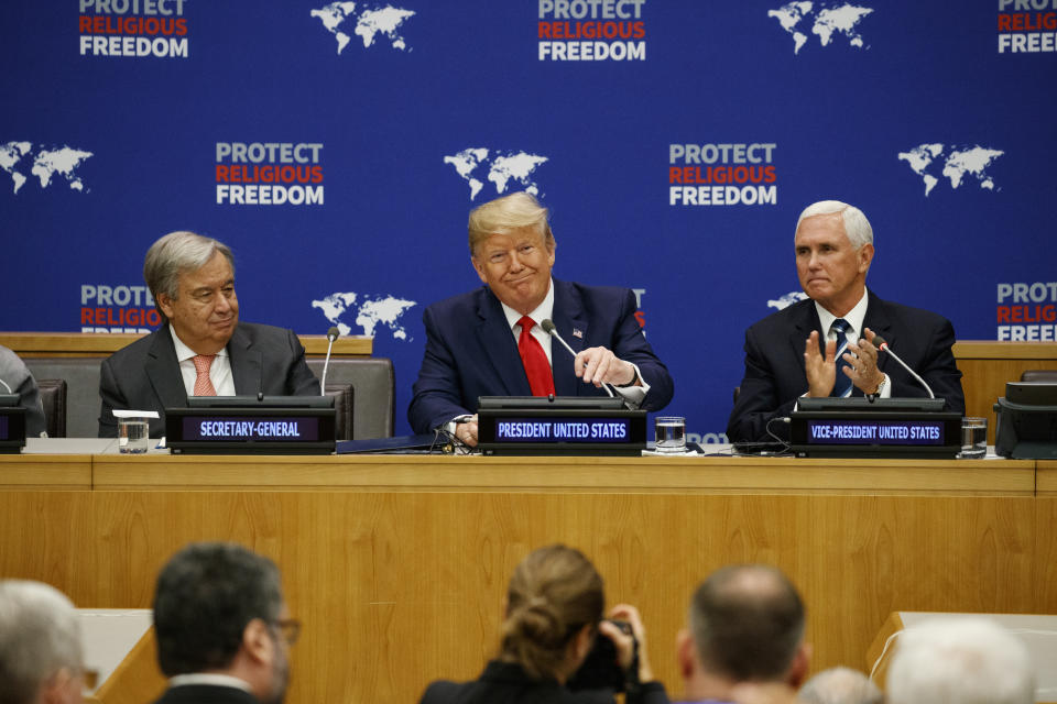United Nations Secretary General Antonio Guterres, left, and Vice President Mike Pence, right, listen as President Donald Trump speaks at an event on religious freedom during the United Nations General Assembly, Monday, Sept. 23, 2019, in New York. (AP Photo/Evan Vucci)