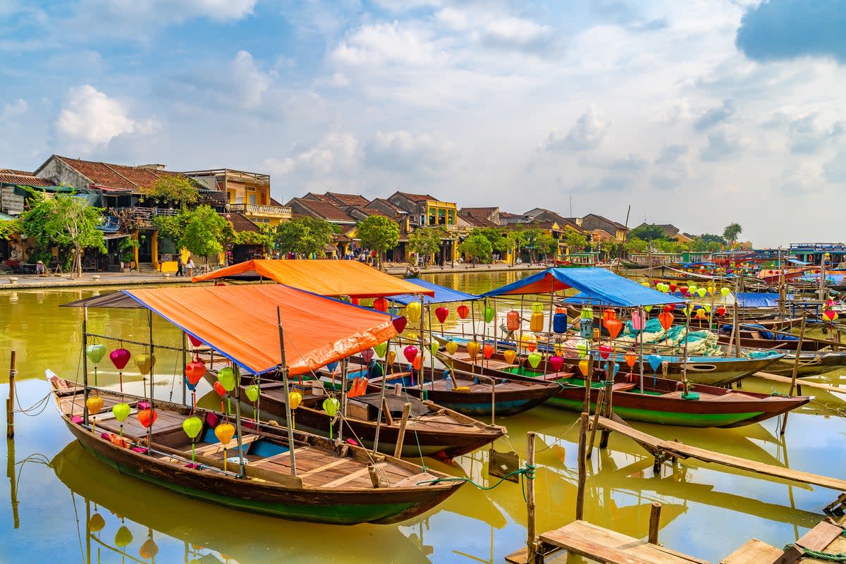 Colourful lanterns decorate wooden boats on the Thu Bon River in Hoi An (Getty Images/iStockphoto)