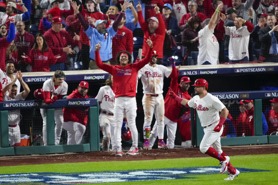 Philadelphia Phillies' Kyle Schwarber celebrates after a home run against the Arizona Diamondbacks during the sixth inning in Game 2 of the baseball NL Championship Series in Philadelphia, Tuesday, Oct. 17, 2023. (AP Photo/Matt Rourke)