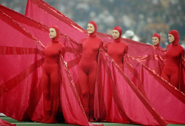 <div class="caption-credit"> Photo by: Getty Images/Al Bello</div>More 1997 weirdness: red winged catsuits that matched the pants and jacket of performer James Brown.