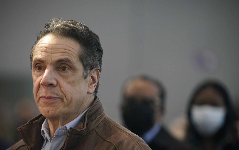 FILE - This Monday, March 8, 2021, file photo shows New York Gov. Andrew Cuomo speaking at a vaccination site in New York. A sixth woman has come forward alleging that Cuomo inappropriately touched her late last year, during an encounter at the governor's mansion. (AP Photo/Seth Wenig, Pool, File)