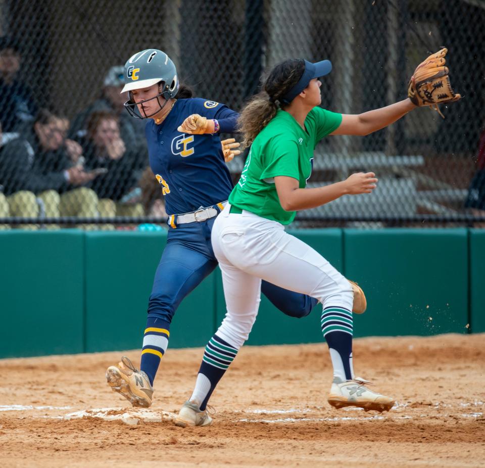 Commodore Collier Peaden beats the throw to first for a single. Gulf Coast State College and Pensacola State faced off in softball at Frank Brown Park Saturday, March 19, 2022.