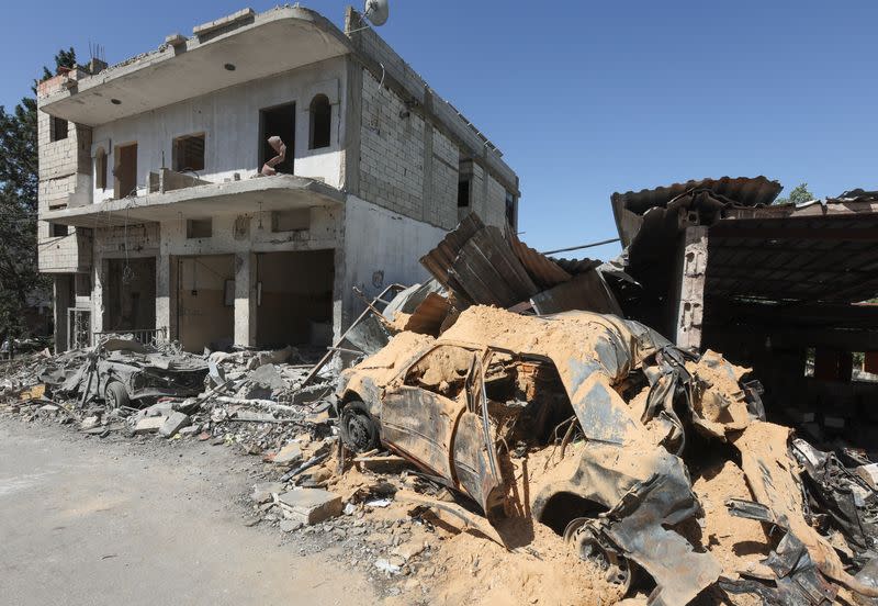 A view shows a damaged building amid ongoing cross-border hostilities between Hezbollah and Israeli forces in Houla village near the border with Israel