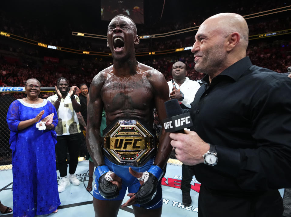 MIAMI, FLORIDA - APRIL 08: Israel Adesanya of Nigeria reacts after knocking out Alex Pereira of Brazil in the UFC middleweight championship fight during the UFC 287 event at Kaseya Center on April 08, 2023 in Miami, Florida. (Photo by Jeff Bottari/Zuffa LLC via Getty Images)