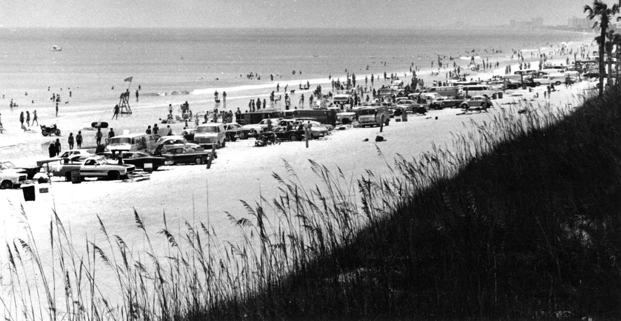 Beachgoers crowd Hanna Park in the summer of 1974, before driving was banned on the sand.