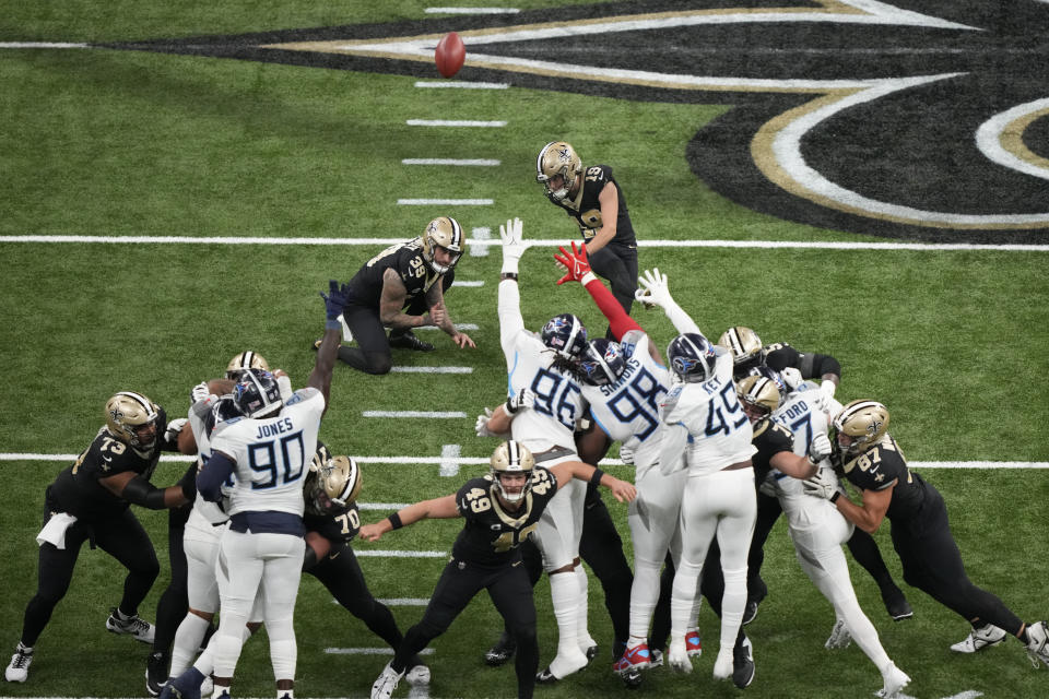 New Orleans Saints place-kicker Blake Grupe (19) kicks a 52-yard field goal against the Tennessee Titans in the second half of an NFL football game in New Orleans, Sunday, Sept. 10, 2023. (AP Photo/Gerald Herbert)