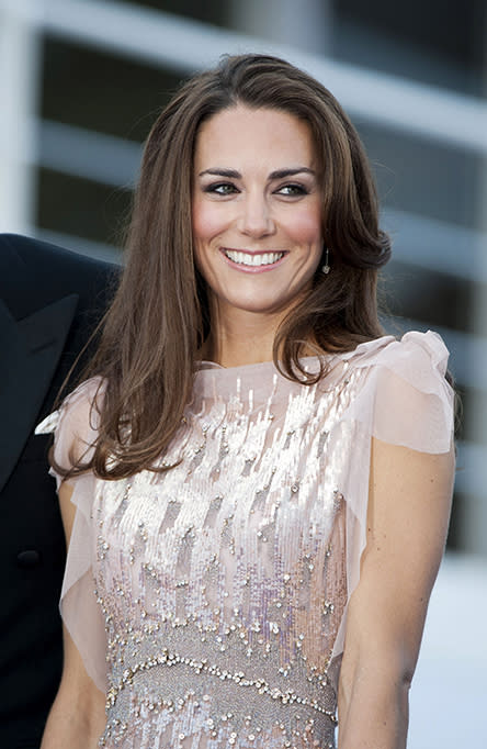 <p>Kate’s side part adds some dimension to this straight-hair mid-length look.</p>