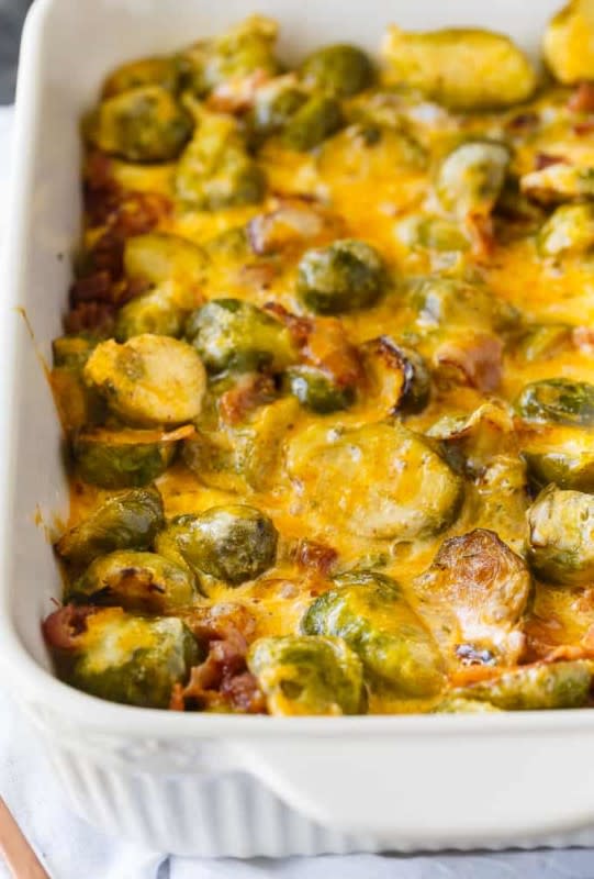 <p>Simply Stacie</p><p>Keto Brussels Sprouts Casserole is cheesy comfort food you can enjoy guilt-free! This delicious casserole is made with tender Brussels Sprouts, bacon and loads of cheese.</p><p><strong>Get the recipe: </strong><a href="https://www.simplystacie.net/keto-brussels-sprouts-casserole/" rel="nofollow noopener" target="_blank" data-ylk="slk:Keto Brussels Sprouts Casserole;elm:context_link;itc:0;sec:content-canvas" class="link "><strong>Keto Brussels Sprouts Casserole</strong></a></p>