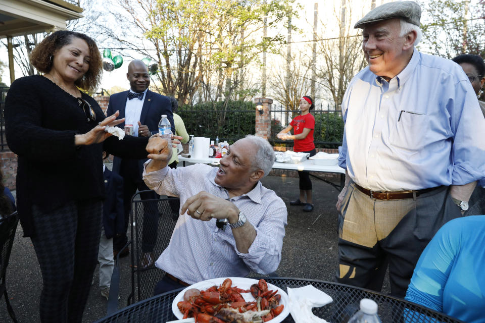 Mike Espy (center), the Democratic nominee for a Senate seat in Mississippi, attempts to fist bump at a crawfish boil in Jackson on March 10, 2020. Espy faces incumbent GOP Sen. Cindy Hyde-Smith in November. (Photo: Rogelio V. Solis/ASSOCIATED PRESS)