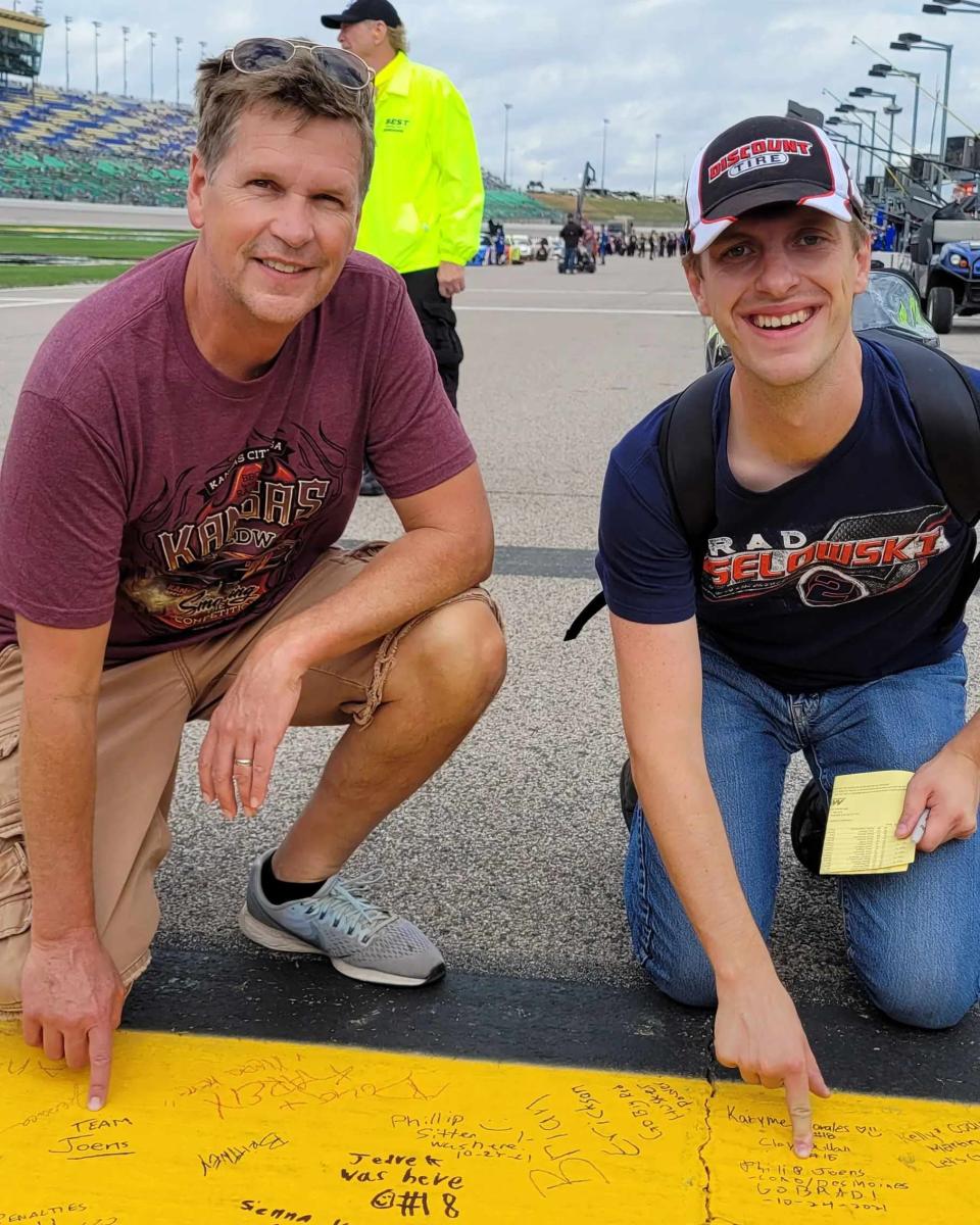 I took my dad Al, left, to the Kansas Speedway for his first race last year.