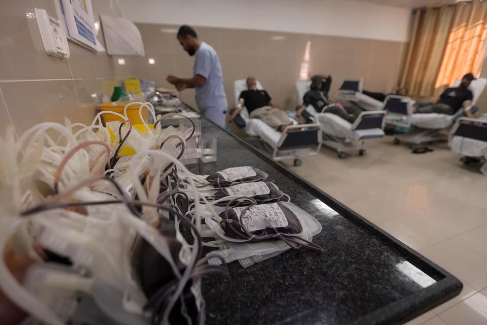 Palestinians donate blood at Nasser hospital in Khan Younis, southern Gaza Strip on Thursday.