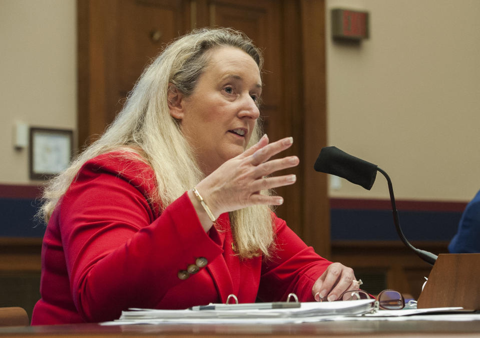 FILE - In this Thursday, May 28, 2020, file photo, Loren Sweatt, Principal Deputy Assistant Secretary, Occupational Safety and Health Administration, testifies before a House Committee on Education and Labor Subcommittee on Workforce Protections hearing examining the federal government's actions to protect workers from the coronavirus, on Capitol Hill in Washington. OSHA said Friday, May 29 that it had issued its first citation in the U.S. related to the coronavirus outbreak: against a Georgia nursing home that delayed reporting the hospitalization of six infected workers. (Rod Lamkey/Pool via AP, File)