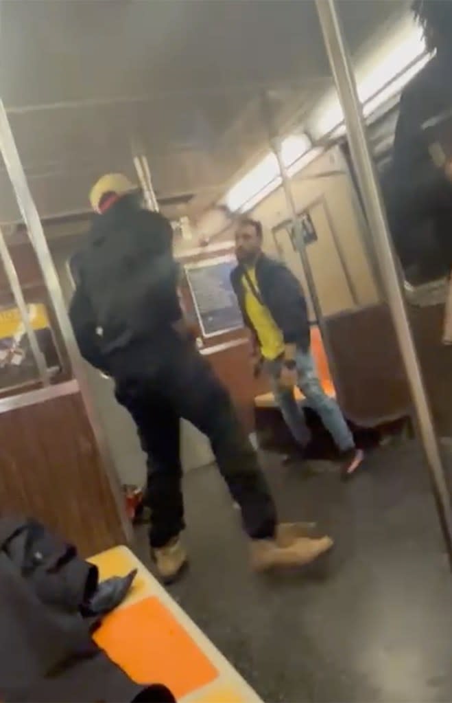 A man wearing a yellow hat was berating a stranger moments after boarding the northbound A train at the Nostrand Avenue station.