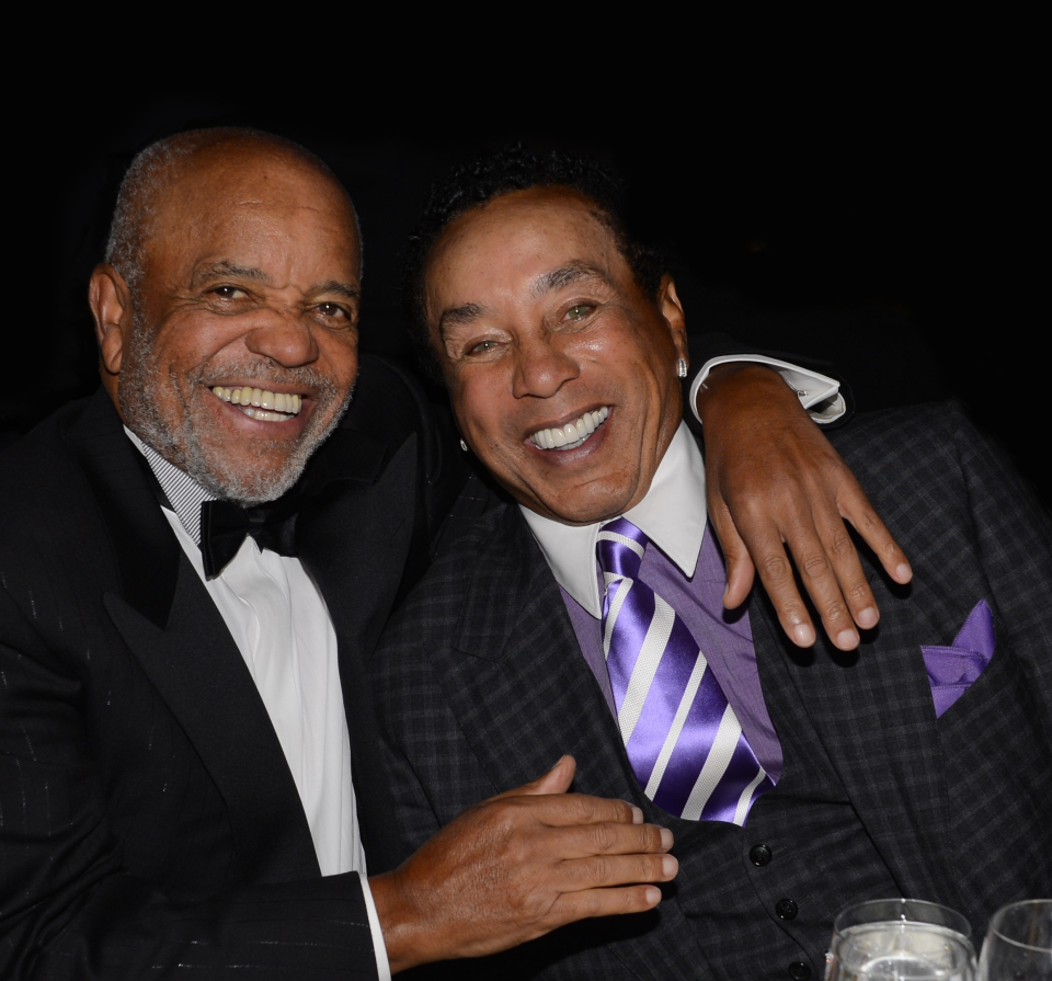 Lifelong friends Berry Gordy (left) and Smokey Robinson will be honored as the MusiCares Persons of the Year in 2023.