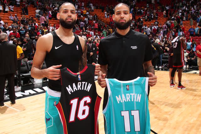 <p>Issac Baldizon/NBAE via Getty</p> Caleb Martin and Cody Martin