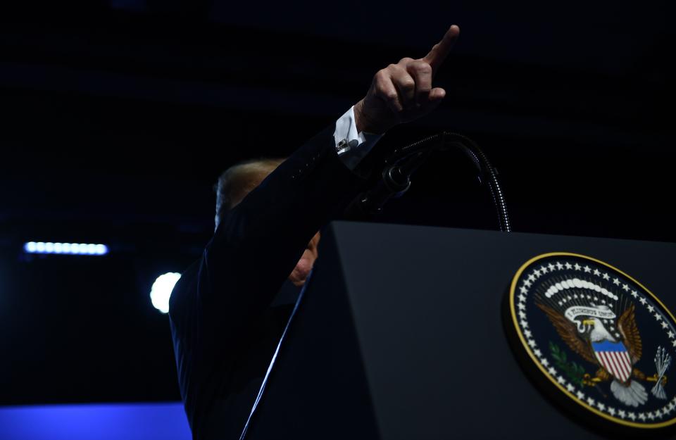 <p>resident Donald Trump gestures as he addresses a press conference on the second day of the North Atlantic Treaty Organization (NATO) summit in Brussels on July 12, 2018. (Photo: Brendan Smialowski/ AFP/Getty Images) </p>