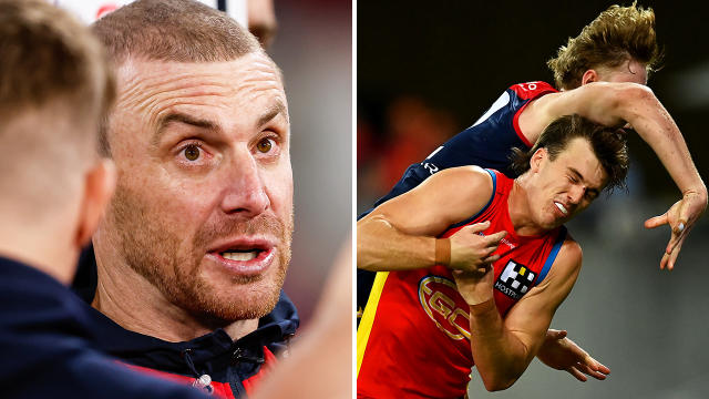 Melbourne Demons coach Simon Goodwin is seen left, with the contest that lead to Jacob van Rooyen&#39;s suspension seen right.