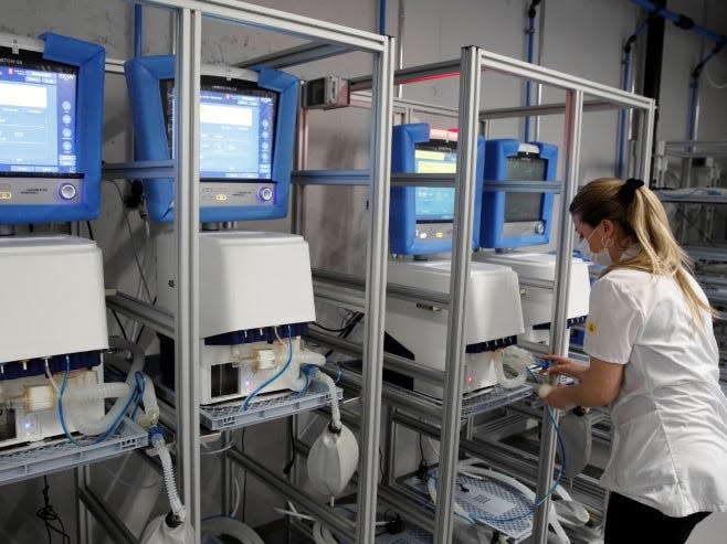 An employee of Hamilton Medical AG tests ventilators at a plant in Domat/Ems, Switzerland March 18, 2020. REUTERS/Arnd Wiegmann