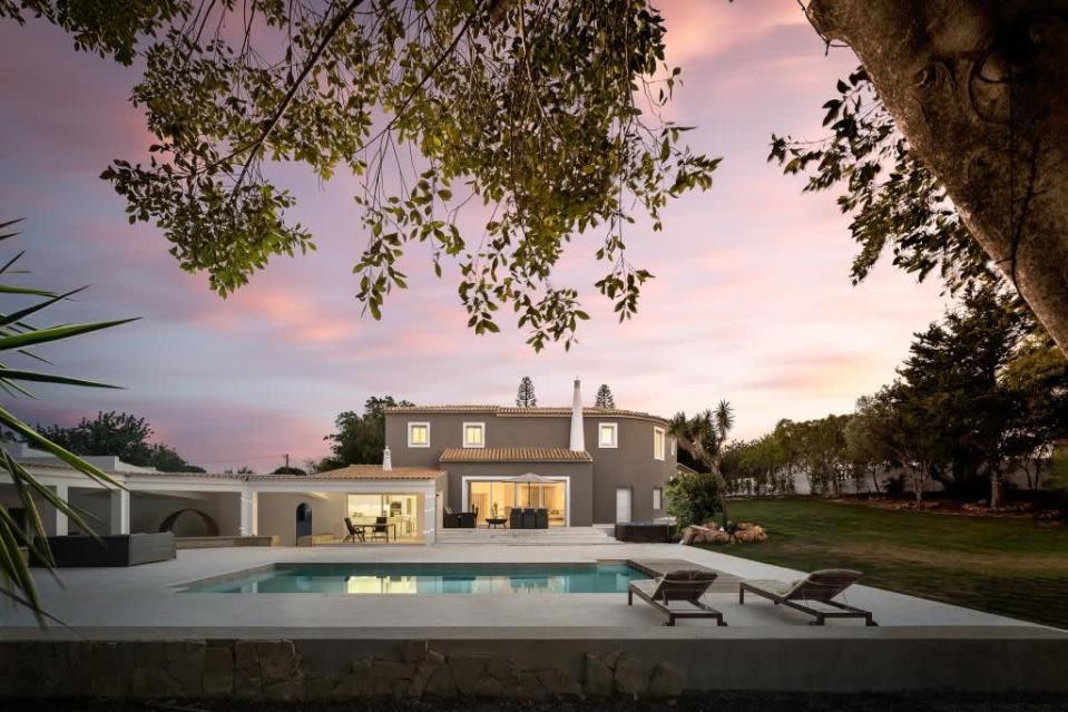 <p>Over in the Algarve, Portugal, this breathtaking five-bedroom villa looks completely divine. Refurbished to a modern standard, it has a fully-fitted kitchen equipped with high quality appliances, six bathrooms, air conditioning, and a swimming pool — perfect for that after-breakfast dip. </p><p>This property is currently on the market for £1,879,020 with Ideal Homes Portugal via <a href="https://www.rightmove.co.uk/properties/73189093" rel="nofollow noopener" target="_blank" data-ylk="slk:Rightmove" class="link rapid-noclick-resp">Rightmove</a>.</p><p><strong><strong>Follow House Beautiful on <a href="https://www.instagram.com/housebeautifuluk/" rel="nofollow noopener" target="_blank" data-ylk="slk:Instagram" class="link rapid-noclick-resp">Instagram</a>.</strong></strong> </p>