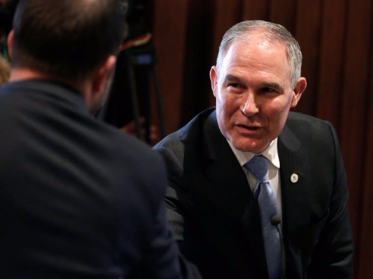 Scott Pruitt, administrator of the Environmental Protection Agency (EPA), greets employees of the agency in Washington, U.S., February 21, 2017.      REUTERS/Joshua Roberts