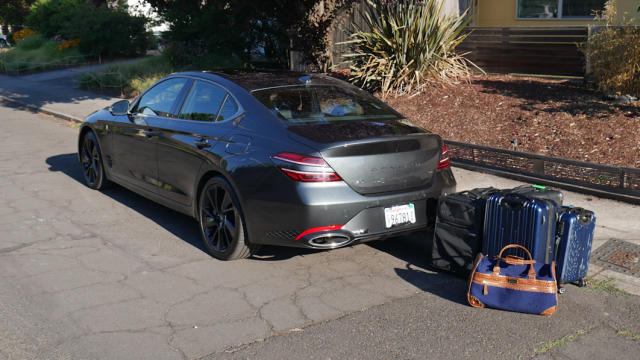 people, women, lady with her Mercedes Benz convertible, suitcase