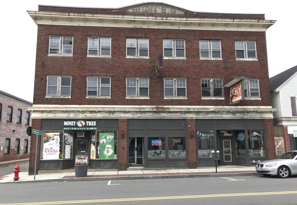 Manuel Soares is proposing to convert a former rooming house at 49 Weir St. in downtown Taunton, seen here on June 13, 2023, into an 18-unit hotel, with storefronts on the ground floor, including his bistro, Ugly Duckling.