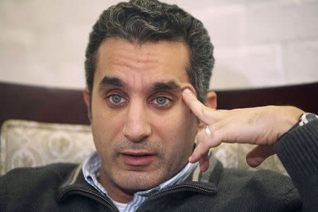 Popular Egyptian satirist Bassem Youssef talks during an interview with Reuters in Cairo in this January 15, 2013 file photo. REUTERS/Asmaa Waguih/Files
