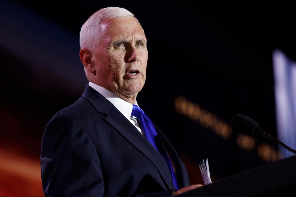 Republican presidential candidate, former Vice President Mike Pence, delivers remarks at the Christians United for Israel summit on July 17 in Arlington, Va.